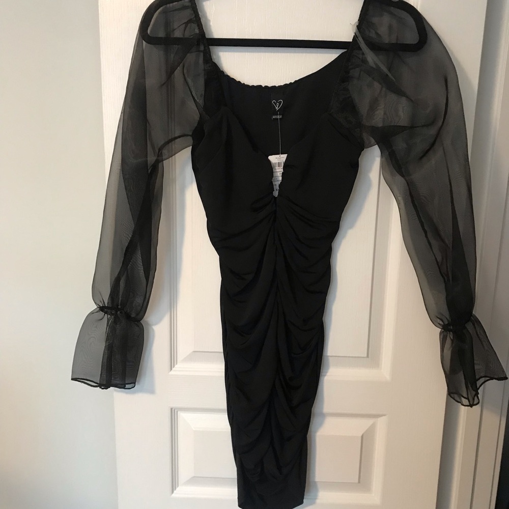 NWT sweet and stylish mesh sleeve bodycon dress